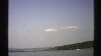 Norway (1976): View Of Green Trees And Calm Blue Lake Water On A Clear Sunny Day
