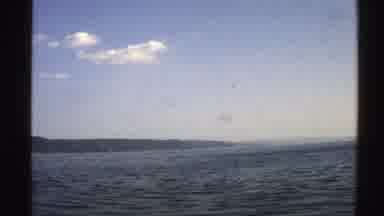 Norway (1976): Oceans cape With A Couple Clouds Overhead And Possibly A Peninsula