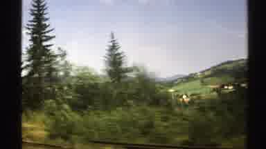 Norway (1976): Passing View Of Green Trees And Hills On A Clear Day