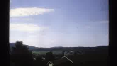 Norway (1976): Moving View Of Blue Sky With Cloud And Trees And Mountains