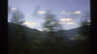 Norway (1976): Camera Shot Of A Mountain That Has A Waterfall And Then In A Car