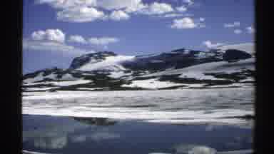 Norway (1976): The View Of A Mountain Top And Its Reflection In A Body Of Water