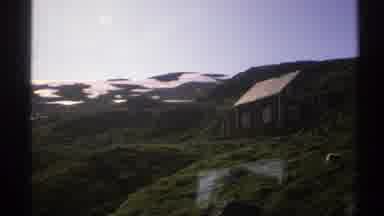 Norway (1976): Passing View Of Snow Covered Hills And Green Trees On A Clear Day