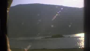 Norway (1976): Evening Time On A Train Moving By Recording A Large Lake