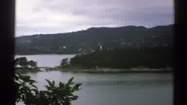 Norway (1976): Birds Eye View Of A Beach Before Panning To The Roof Of A Church