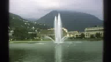 Norway (1976): A Fountain In The Middle Of A Lake Surrounding By Mountains And