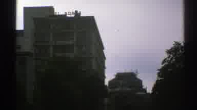 Norway (1976): View Of White Building And Trees On A Cloudy Day