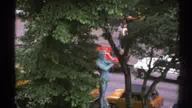 Norway (1976): Tree With Statue And People Walking By On Sidewalk Then Hill In
