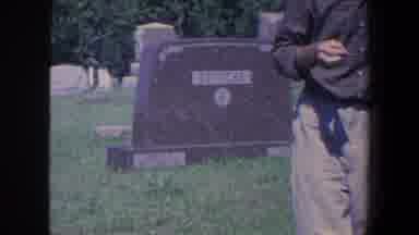 Iowa (1959): Person Visiting A Graveyard During A Sunny Morning Vintage Footage