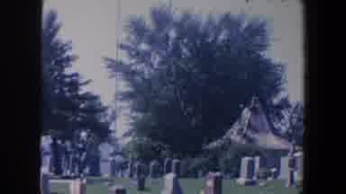 Iowa (1959): Overlooking A Graveyard And Its Green Grass Green Trees And A Nearby