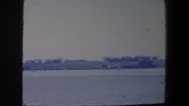 Iowa (1959): Water With A Town Forest And Hills In The Distance