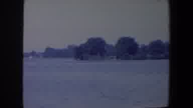 Iowa (1959): Panning Shot Of Lakefront Property Houses Trees Still Waters Clear