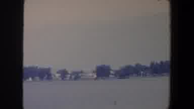 Iowa (1959): A Quiet Lake View With A Lot Of Trees Under A Gray Day