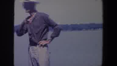 Iowa (1959): Men Standing By Water Laughing Man Mowing The Lawn
