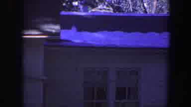 Iowa (1959): A Home Has Patches Of Snow On Its Shingled Roof And Shadows From