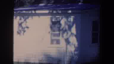 Iowa (1959): Shadow Play Of The Trees In The Front Yard On The Side Of A House