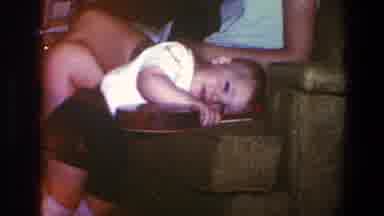 Saint Paul Minnesota (1973): Babies Music Instrument Toy Playing Tired Bored