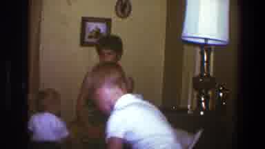 Saint Paul Minnesota (1973): Little Boy Tries To Balance A Plate On Babies Head