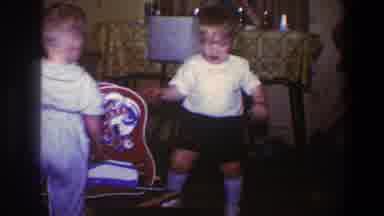 Saint Paul Minnesota (1973): Two Toddlers Play On A Dining Room Floor With A