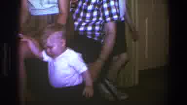 Saint Paul Minnesota (1973): Toddler Wearing White Shirt Walks From Sitting Woman