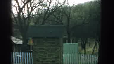 Wisconsin (1957): Panning Video Of Trailer Park And Picket Fence In The Woods