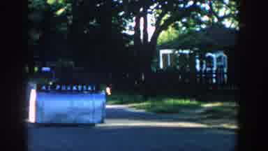 Wisconsin (1957): Boy Outside Of House Near Mailbox With Houses And Trees