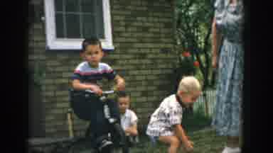 Wisconsin (1957): Playing In The Front Yard Of Grandmas Brick House Fenced