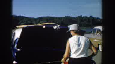 Wisconsin (1957): Family Outside Of Car Side Of Road Fishing Poles In Hand