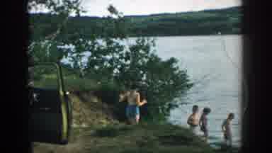 Wisconsin (1957): Four Young Boys Playing Outside Near The Water In The Lake