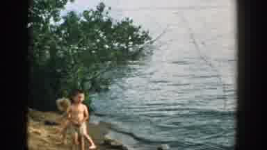 Wisconsin-1957: Kids Playing And Enjoying Near A Lake And Inside Water
