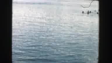 Wisconsin (1957): People Are Playing In The Lake On A Warm Day