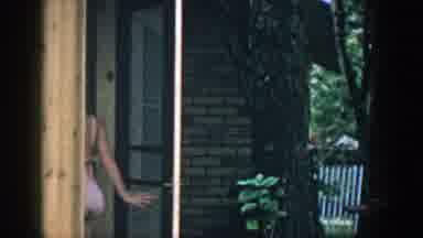 Wisconsin (1957): Old Home Footage Of Woman Walking Across Lawn And Going Indoors