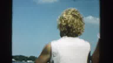Wisconsin (1957): Blonde Woman Inside A Boat Observing The Natural Landscape