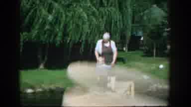 Wisconsin (1957): Grand Father Showing How To Fish To His Grandson