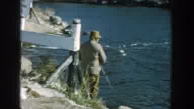 Wisconsin (1957): Man Spending Time Fishing On The River