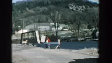 Wisconsin (1957): Old Footage With A Bridge Towards Hills Lake Or Sea To The Left