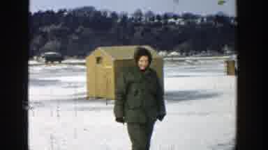 Wisconsin (1957): Woman Apparently The Antarctic Tries To Fish With A Rod Through