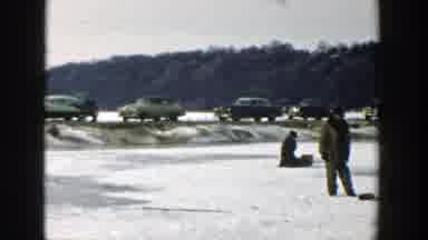 Wisconsin (1957): Panoramic View Of People Sitting With Cars In The Background And