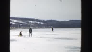 Wisconsin (1957): Scattered Group Of People Enjoying The Snow And Boy Playing