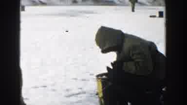 Wisconsin (1957): Skiers In Snowsuits Inspecting The Snow At The Ski Resort