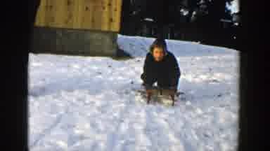 Wisconsin (1957): Little Boy Riding His Little Sled Down The Snowy Hill