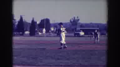North Hollywood California (1961): A Man Throws A Ball At A Player On The Pitch
