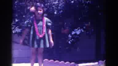 North Hollywood California (1961): A Little Girl Is Trying To Entertain With Her