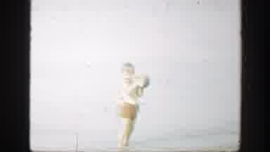 Connecticut (1947): Kid Playing With A Ball At The Beach