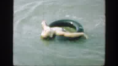Connecticut (1947): Two Girls In Swimsuits Swimming In The Water And Playing While
