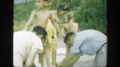 Connecticut (1947): Adults And Children Playing In The Sand On The Beach In The
