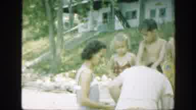 Connecticut (1947): Young Family Drying Off While In Their Swimsuits With Mother