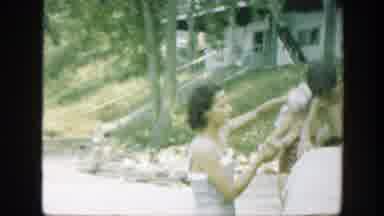 Connecticut (1947): A Woman Bathing Her Child With A Bucket Of Water And Sponge