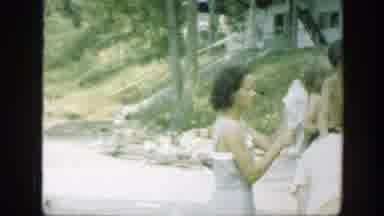 Connecticut (1947): Mother Drying Her Children In Swimsuits In A Ground Next To A
