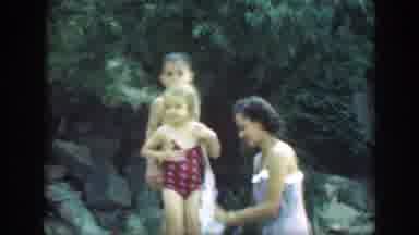 Connecticut (1947): Woman Wearing Blue Swimwear Dries Girl Wearing Red Swimwear